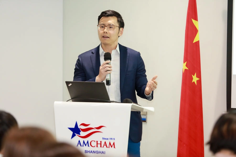 Jack Wu speaking at an AmCham Shanghai chamber event